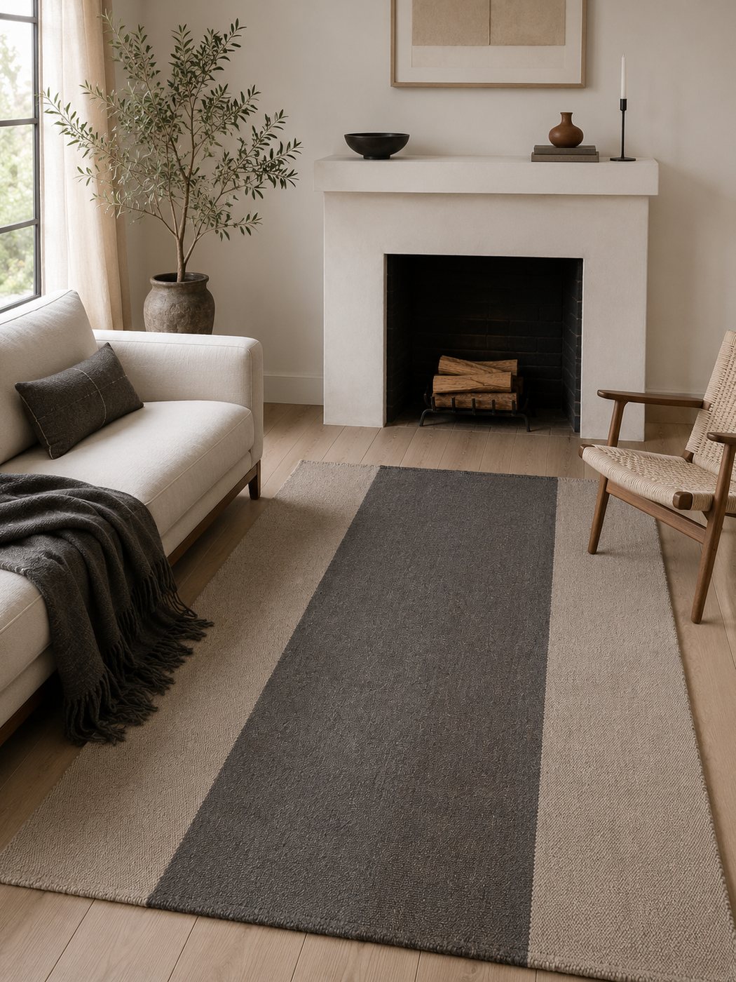 Grey centre, ecru border handwoven goat hair rug
