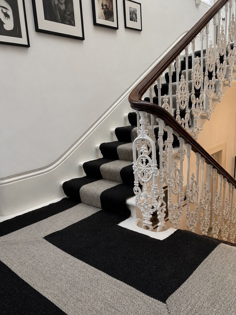 Black and grey handwoven stair runner shown on staircase